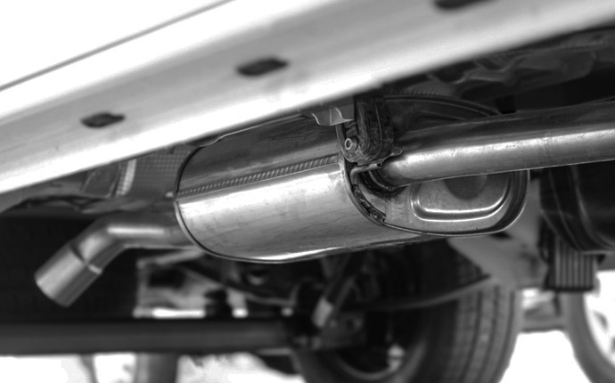 a picture of a car's exhaust system featuring a catalytic converter