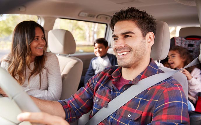 A family in a car together