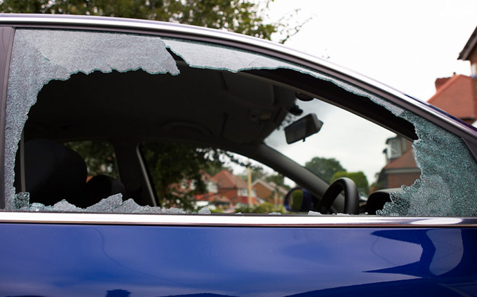 a car with a smashed in window